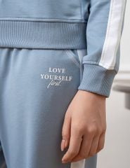 Bộ nỉ cổ tròn nữ hình in trước ngực quần ông suông