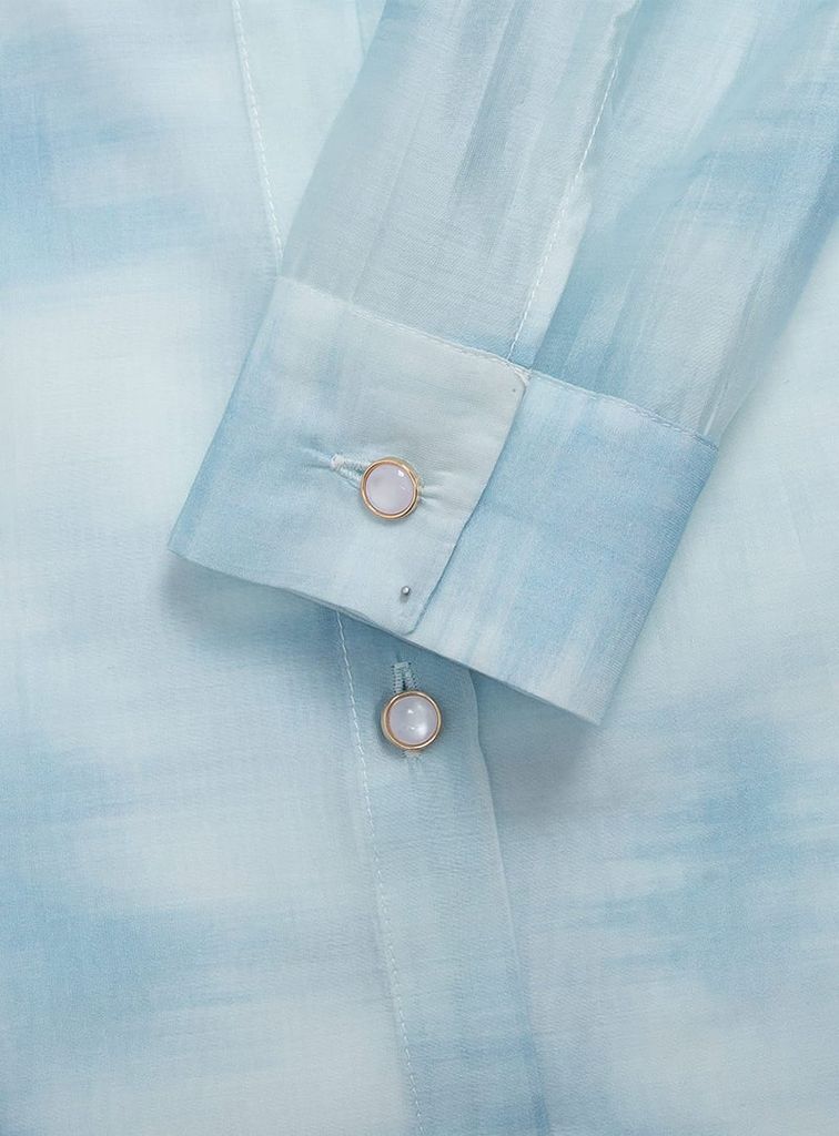 Áo sơ mi dài tay nữ in loang phối áo hai dây trắng