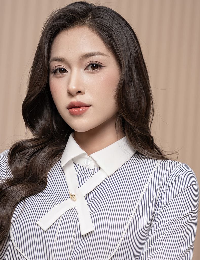 Áo sơ mi kẻ dài tay nữ nơ trang trí