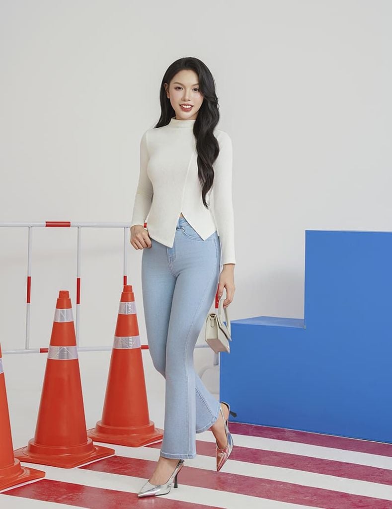 Áo thun nữ dài tay cổ cao gấu chéo cách điệu