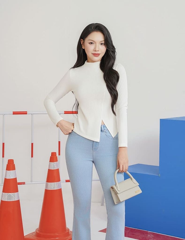 Áo thun nữ dài tay cổ cao gấu chéo cách điệu