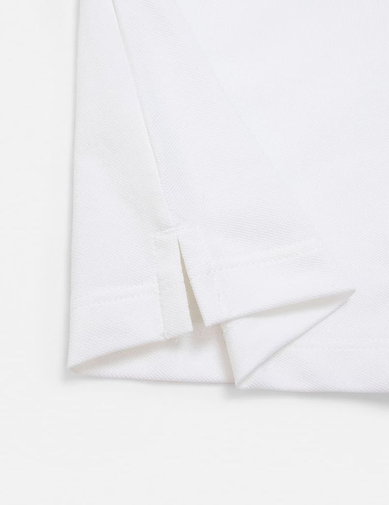 Áo polo nữ phối tay in hình trước ngực