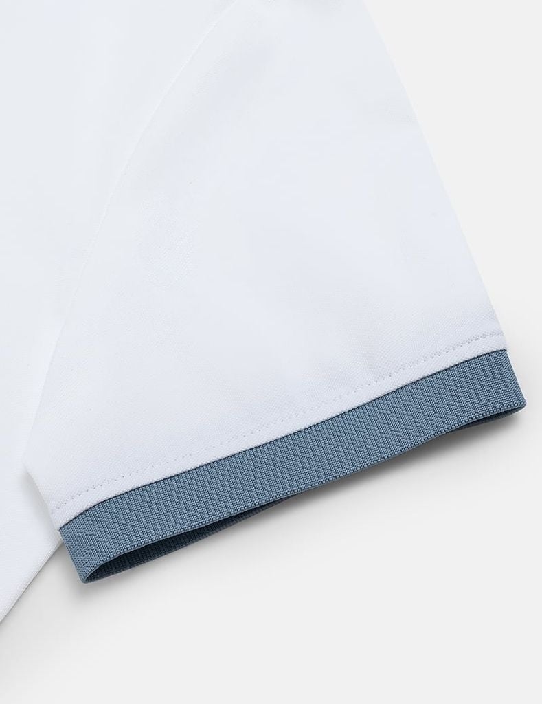 Áo polo nữ hình thêu ở nẹp cổ