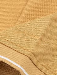 Áo polo ngắn tay nữ xẻ tà thêu logo tay
