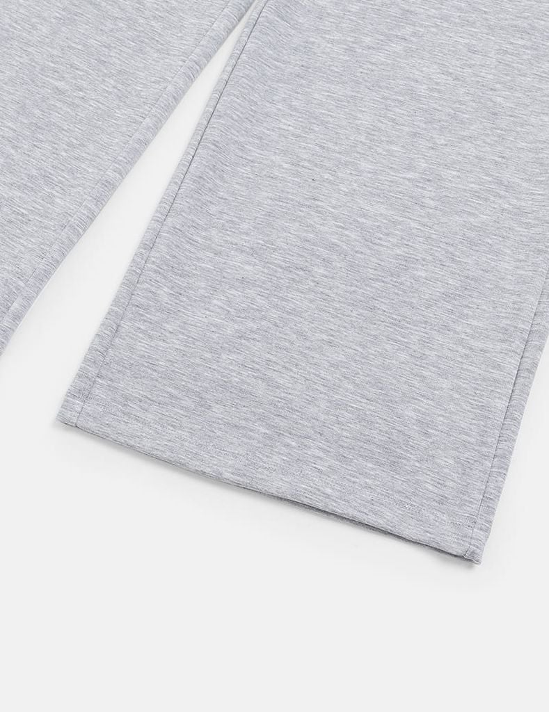 Quần nỉ nữ ống suông sườn gắn mác dệt