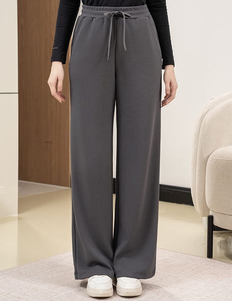 Quần nỉ nữ ống suông sườn gắn mác dệt