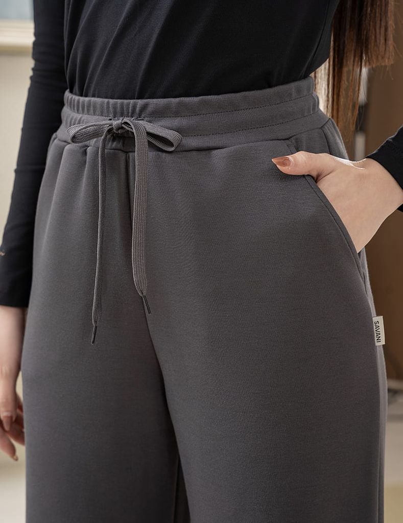 Quần nỉ nữ ống suông sườn gắn mác dệt