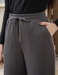 Quần nỉ nữ ống suông sườn gắn mác dệt