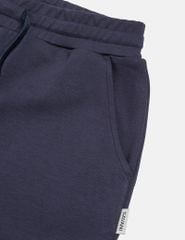 Quần nỉ nữ ống suông sườn gắn mác dệt