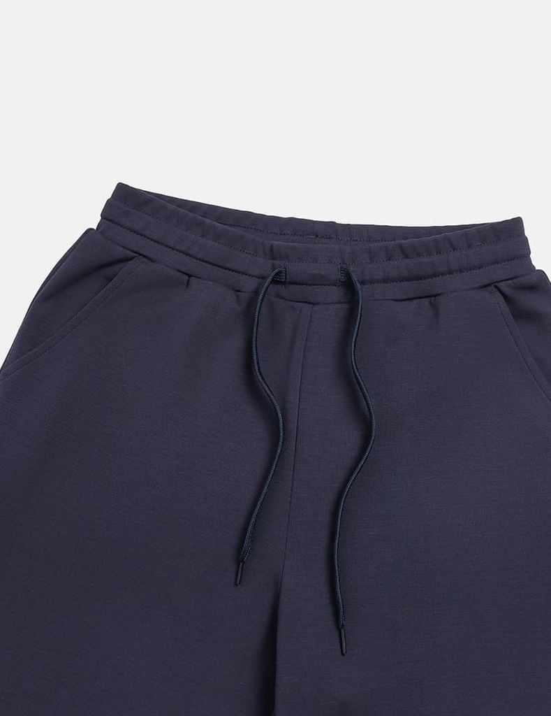 Quần nỉ nữ ống suông sườn gắn mác dệt