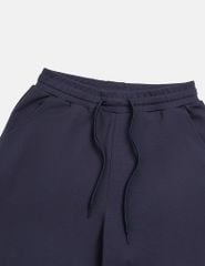 Quần nỉ nữ ống suông sườn gắn mác dệt