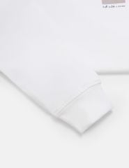 Áo thun nữ dài tay cổ tròn hình in trước ngực