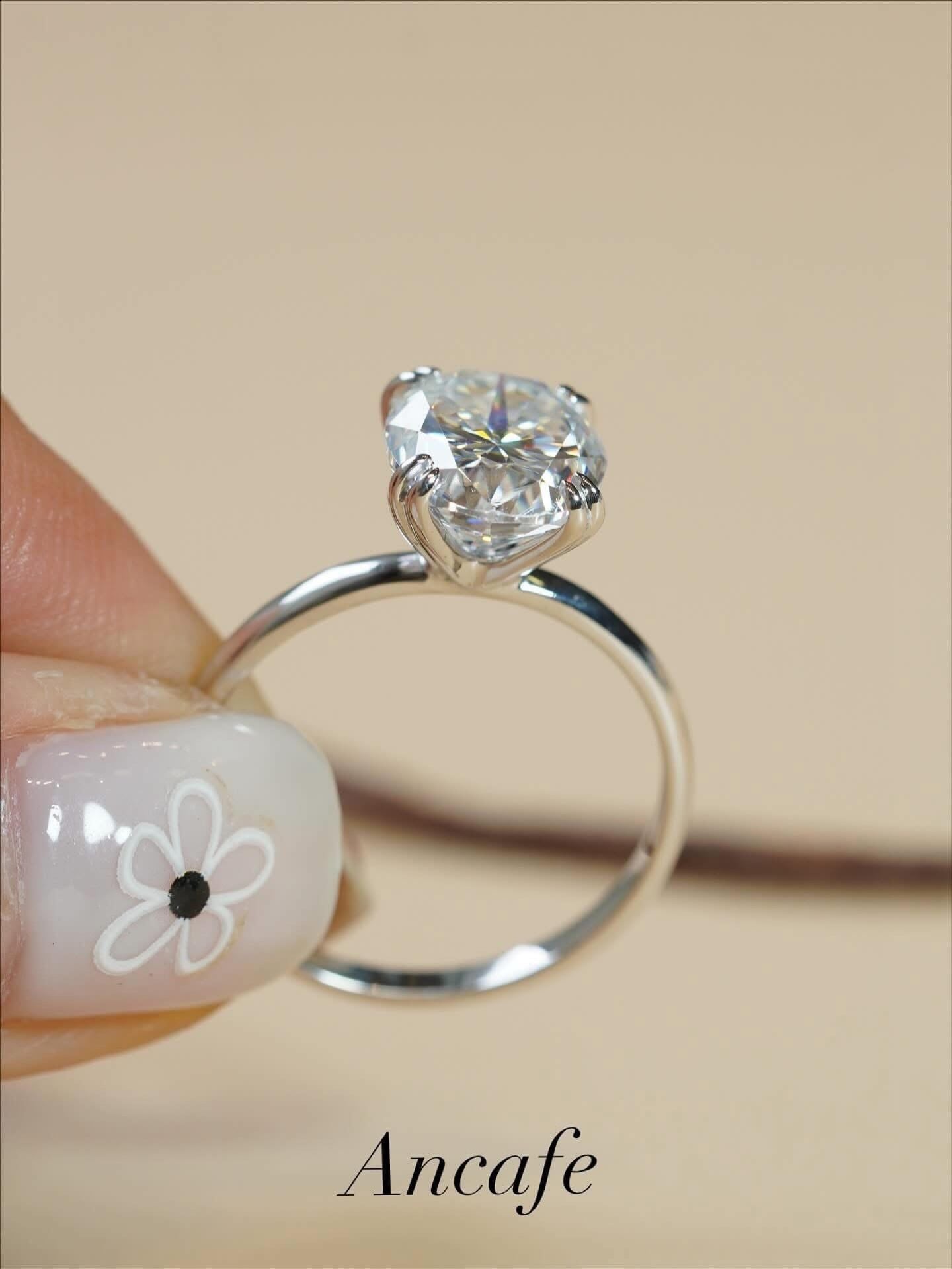 Nhẫn viên chủ shape Oval - 4 chấu đôi