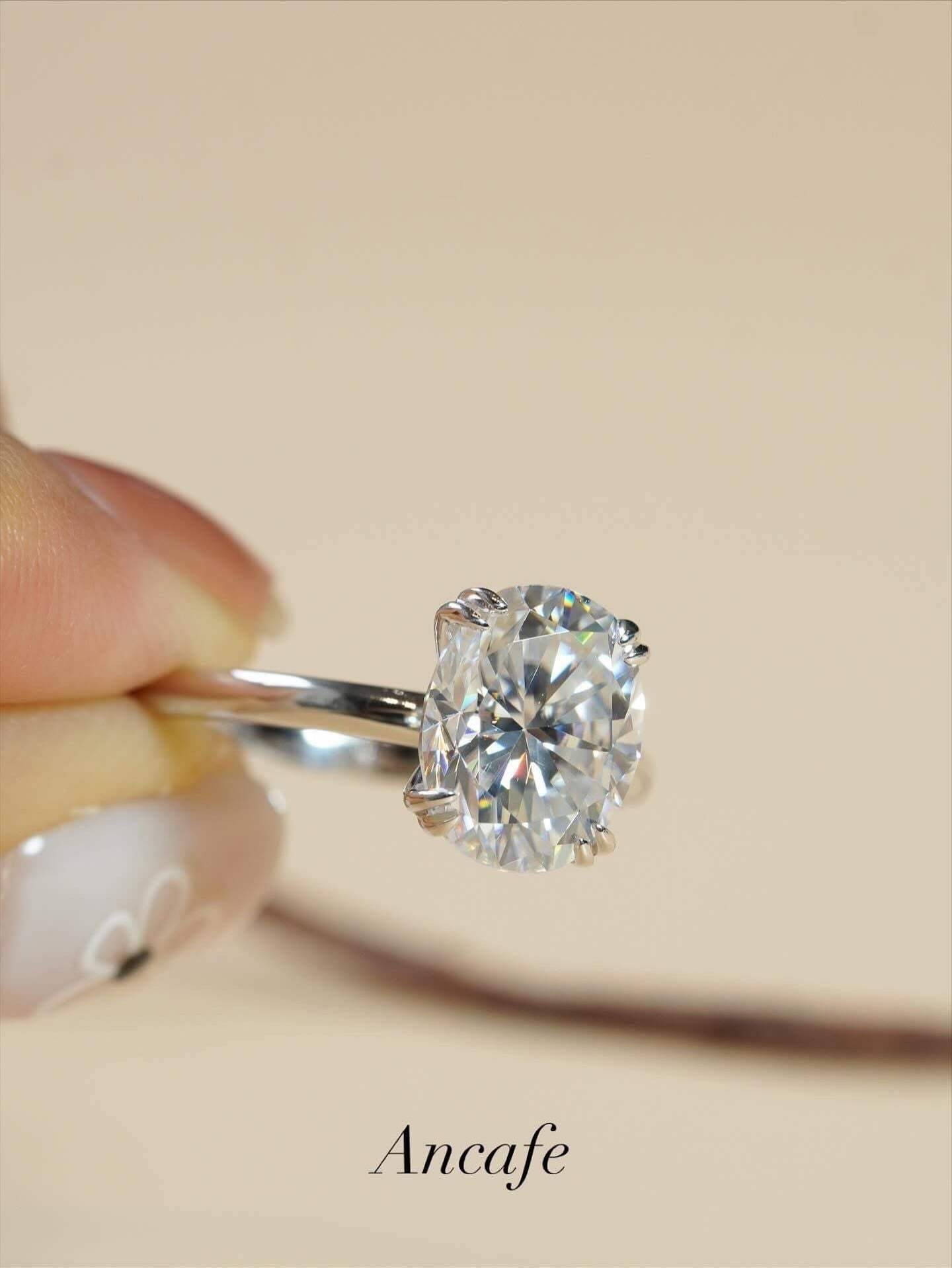 Nhẫn viên chủ shape Oval - 4 chấu đôi