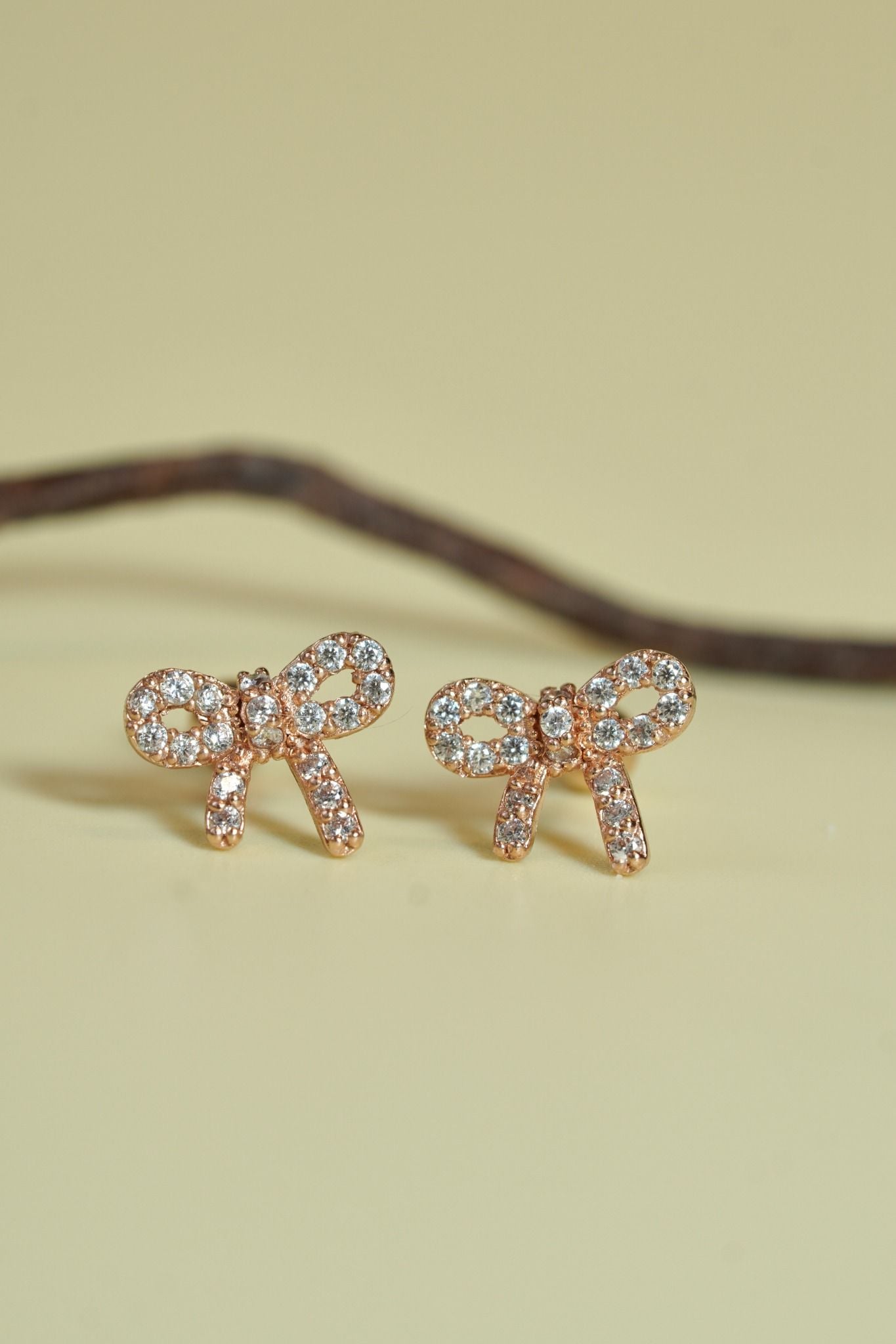 Hoa tai vàng 14k nơ đính đá