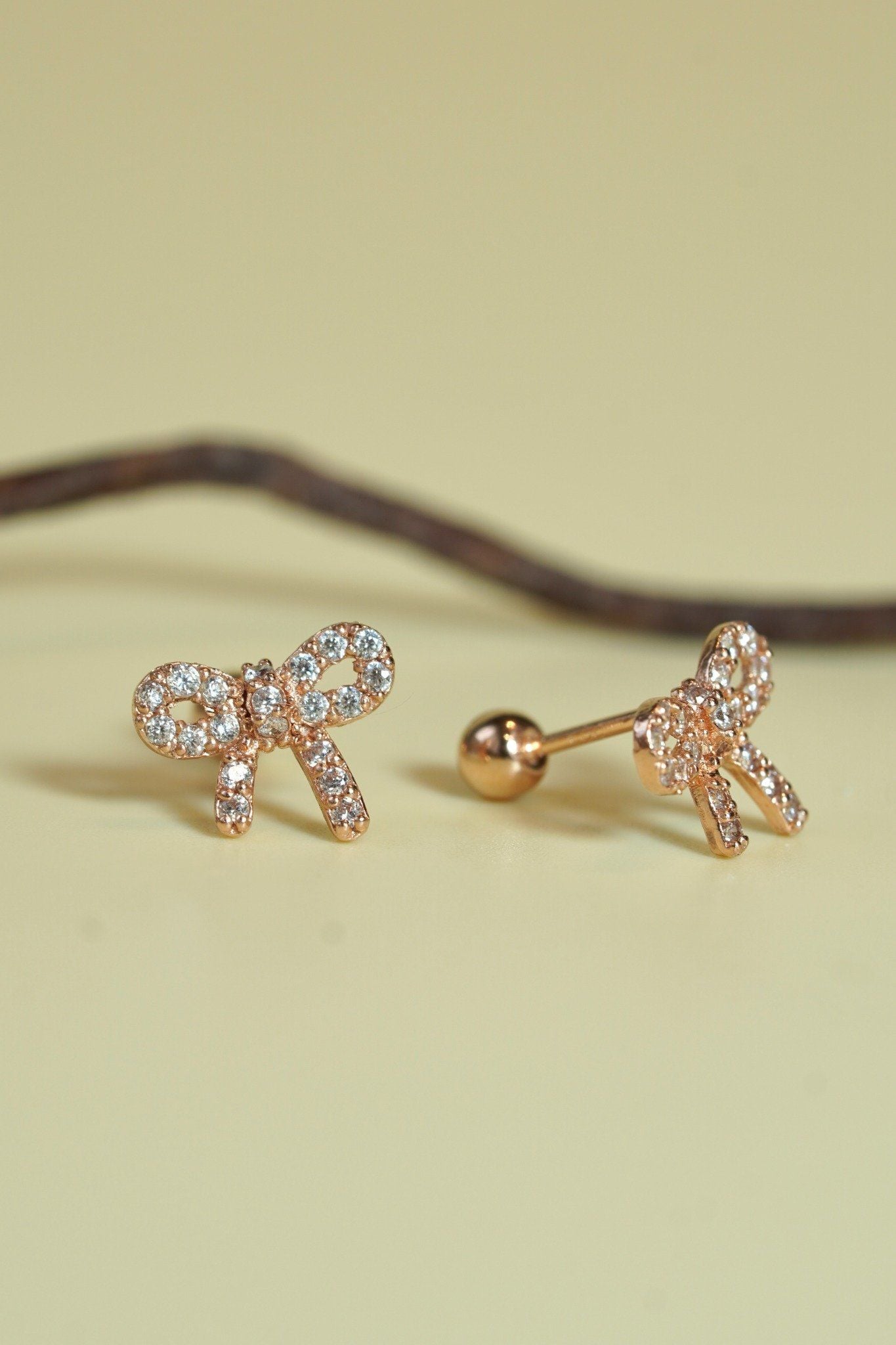 Hoa tai vàng 14k nơ đính đá