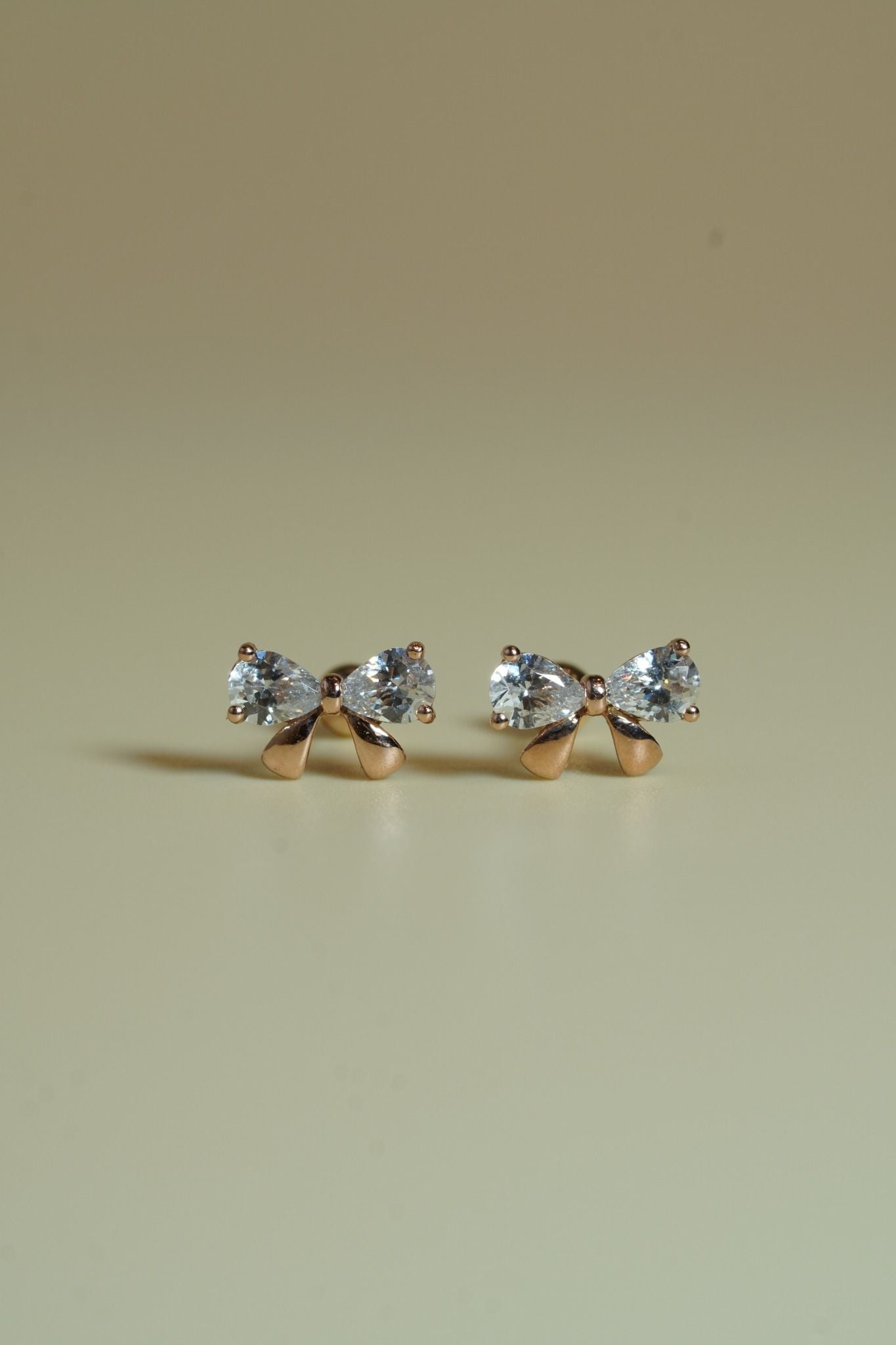 Hoa tai vàng 14k nơ đính đá