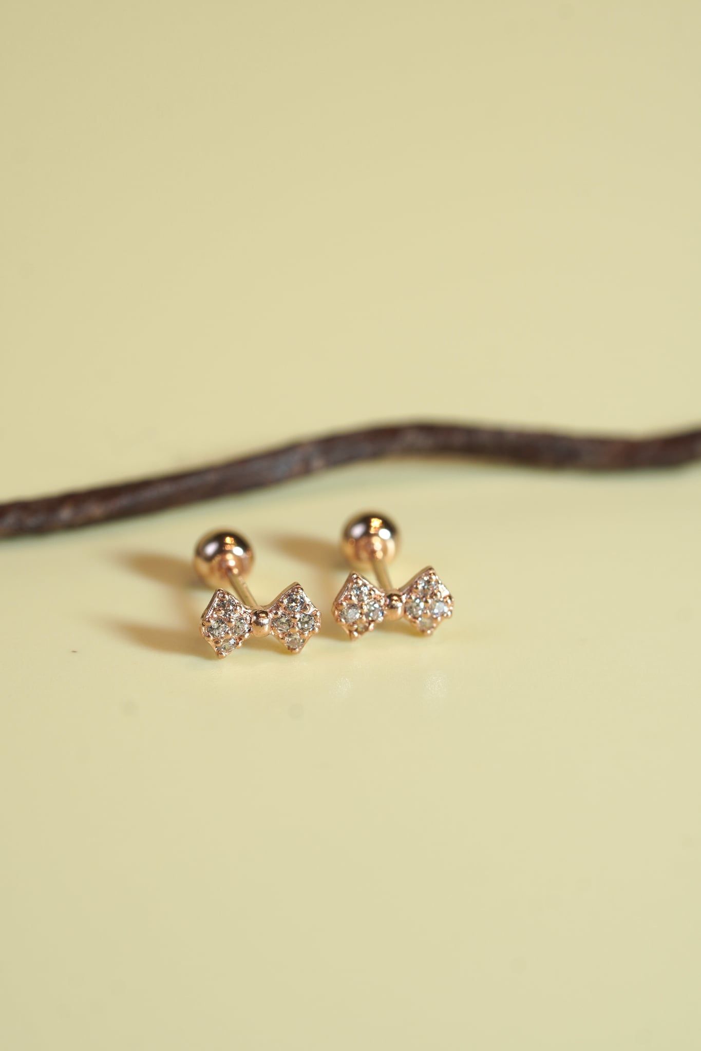 Hoa tai vàng 14k nơ đính đá (ER-GLD-095)