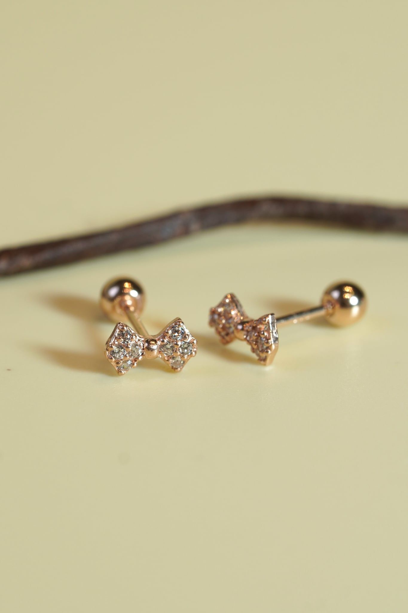 Hoa tai vàng 14k nơ đính đá (ER-GLD-095)
