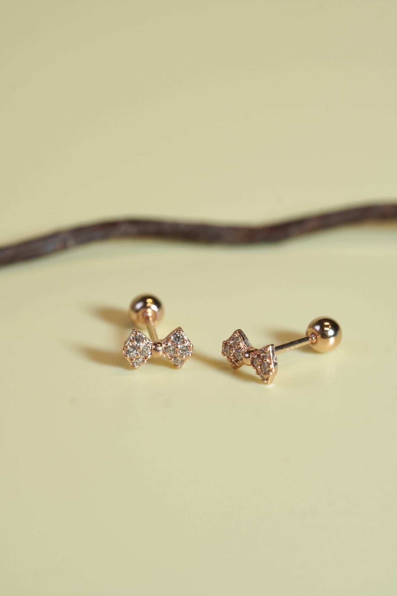 Hoa tai vàng 14k nơ đính đá (ER-GLD-095)