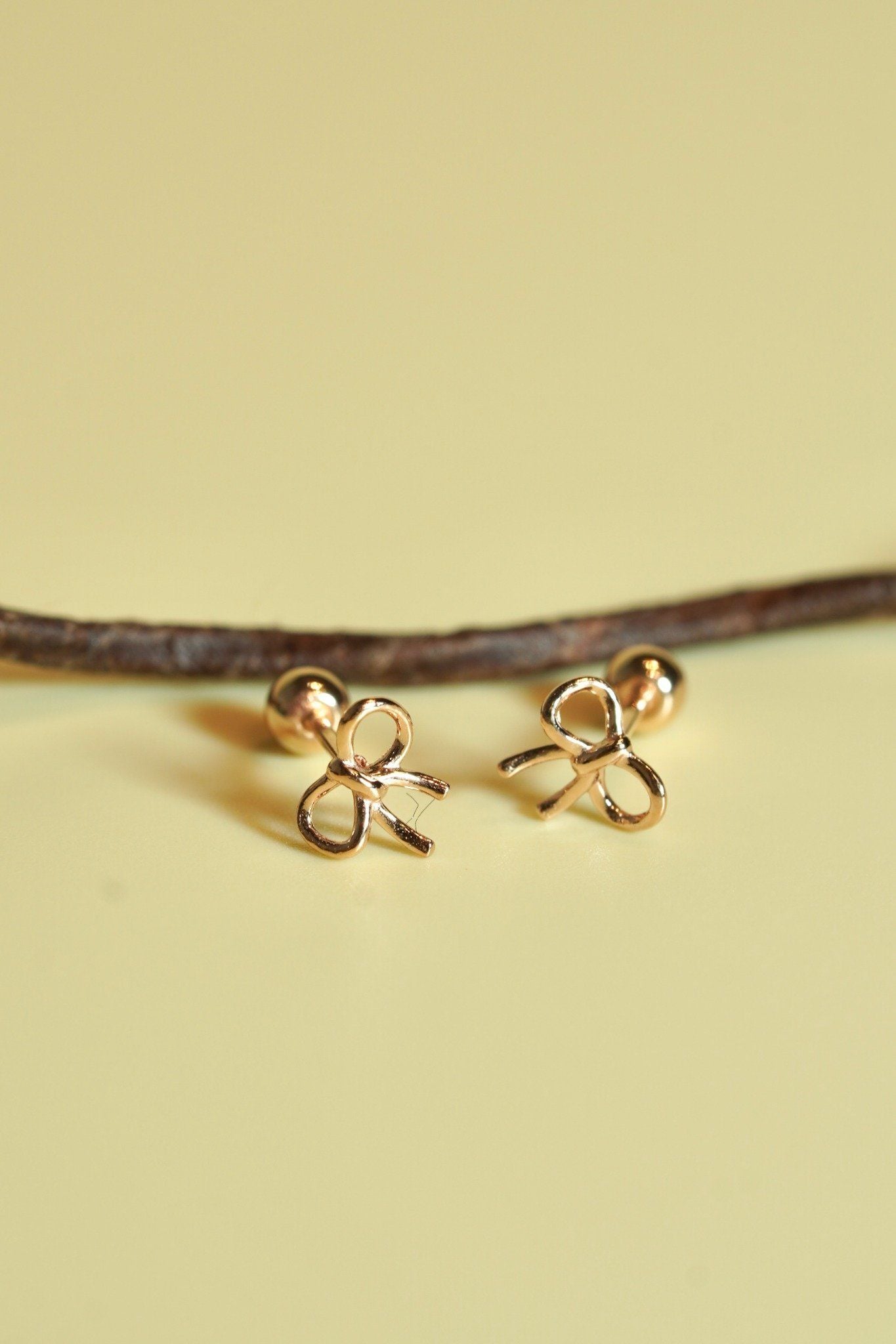 Hoa tai vàng 14k nơ trơn