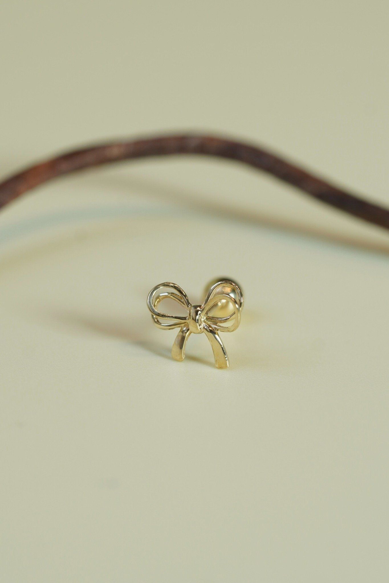 Hoa tai vàng 14K nơ 2 lớp