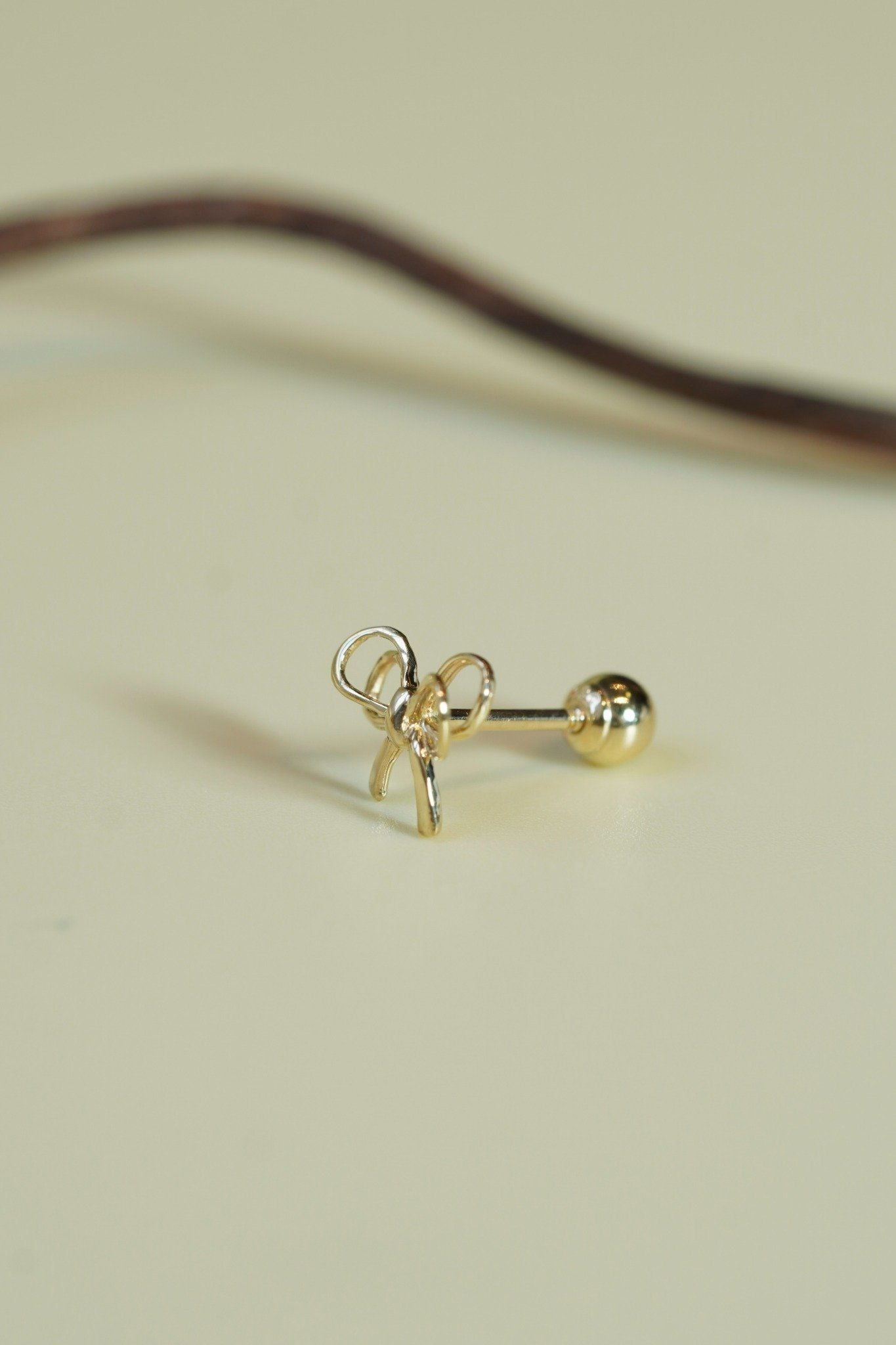 Hoa tai vàng 14K nơ 2 lớp