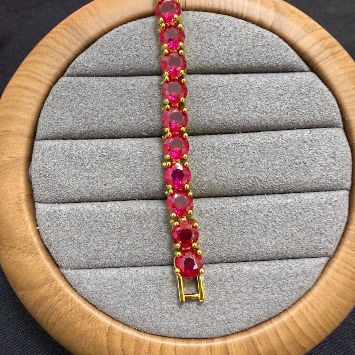  Vòng tay ruby đỏ mạ vàng 18 k sáng bóng 