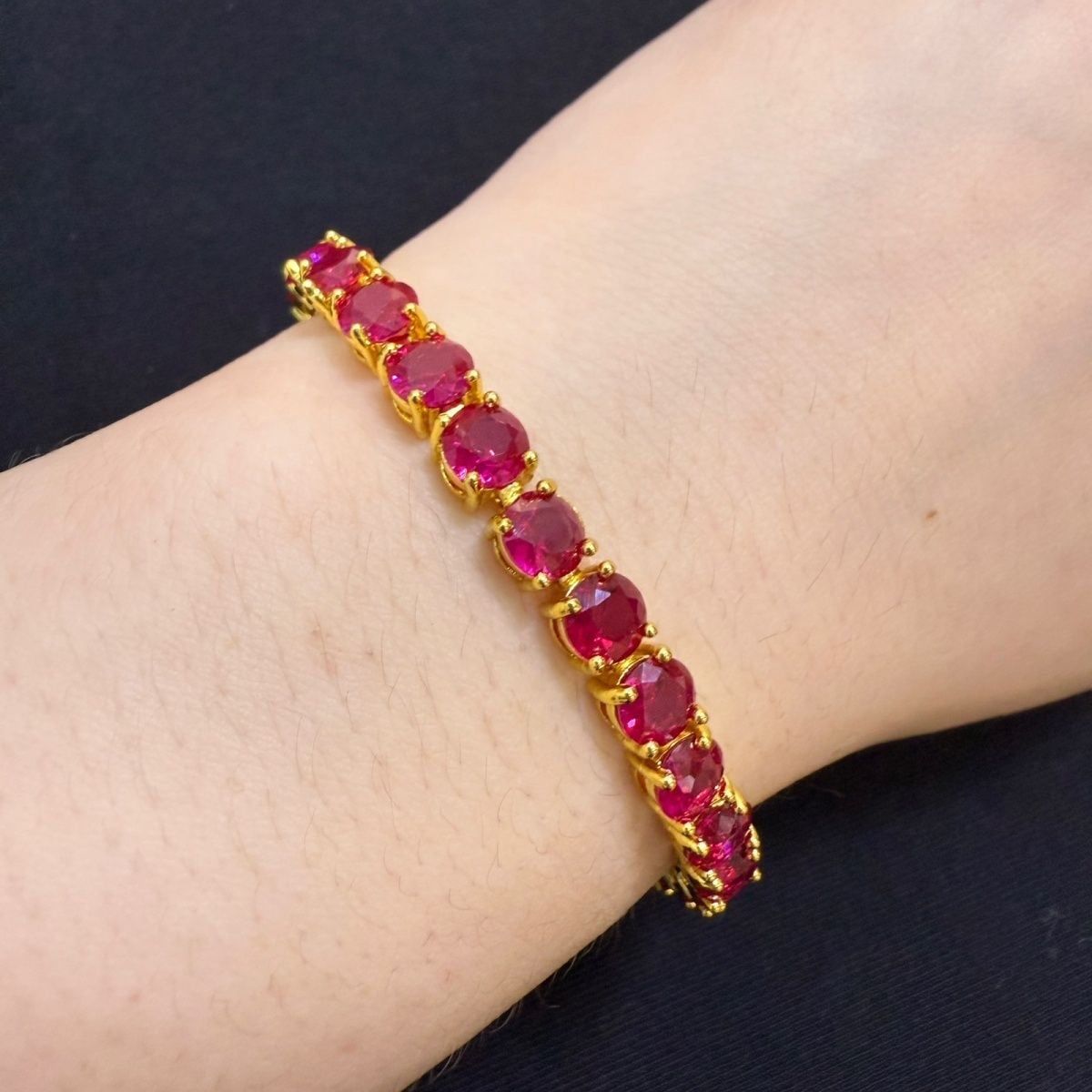  Vòng tay ruby đỏ mạ vàng 18 k sáng bóng 