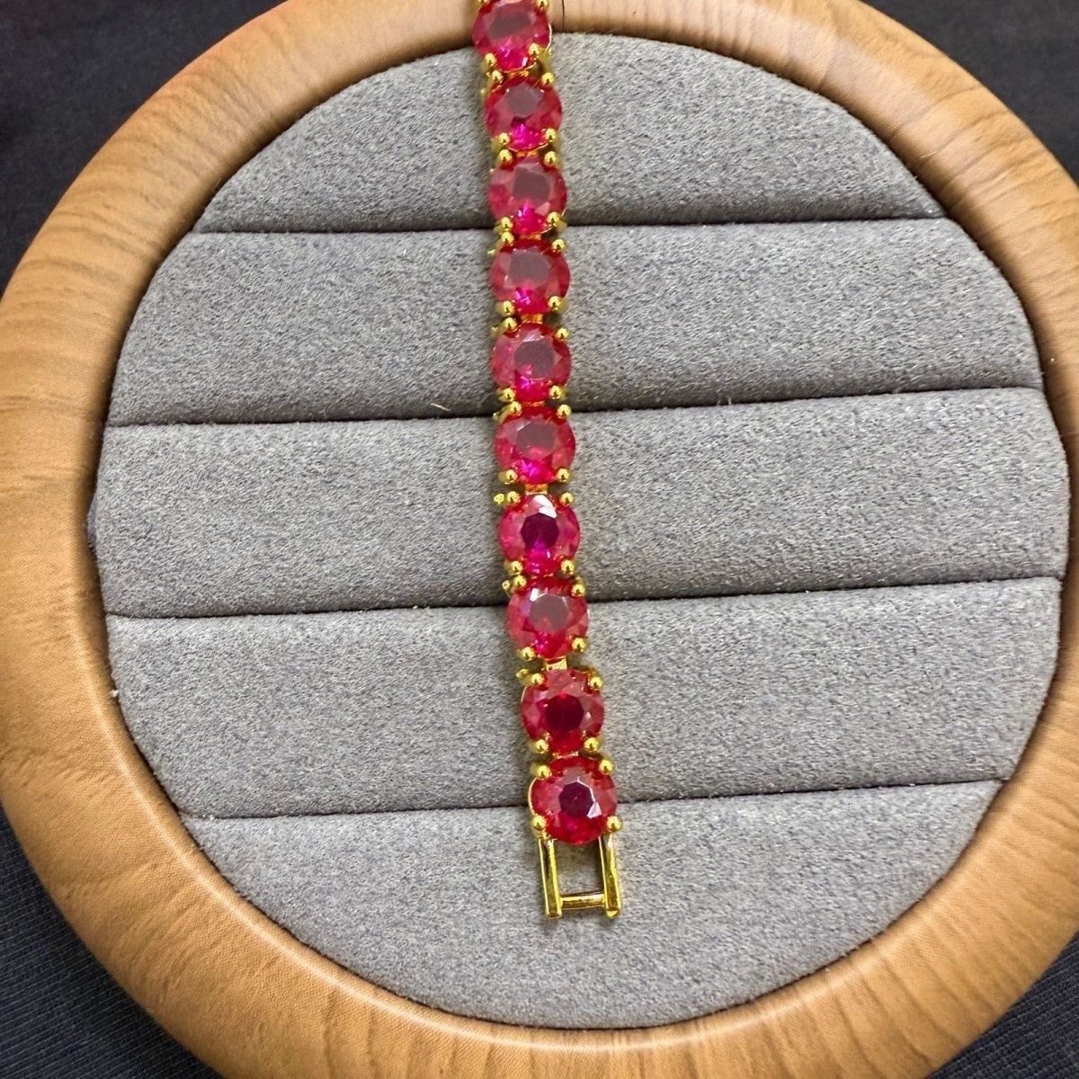  Vòng tay ruby đỏ mạ vàng 18 k sáng bóng 