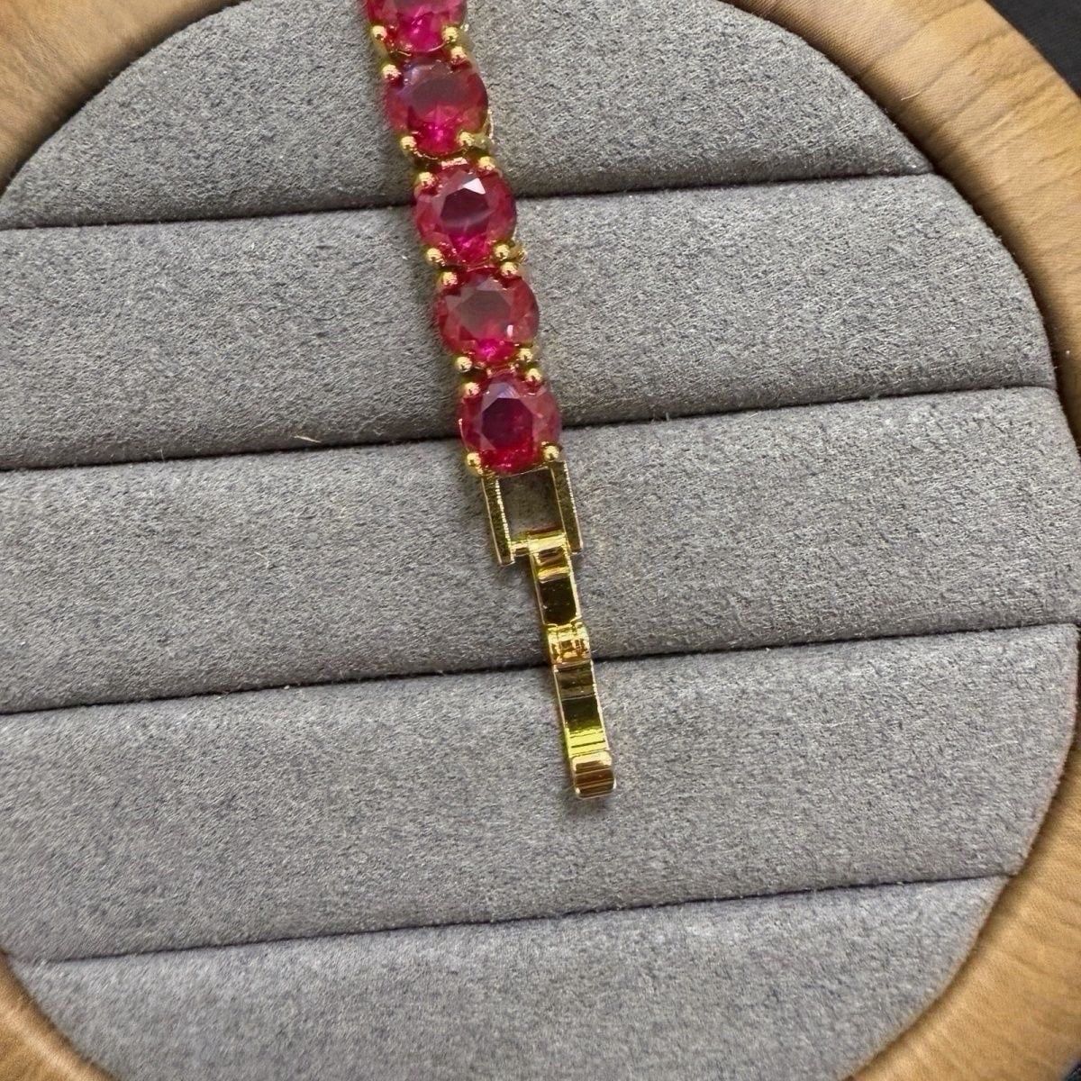 Vòng tay ruby đỏ mạ vàng 18 k sáng bóng 