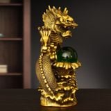  Rồng vờn ngọc   Kt 20* 9* 15 cm Chất liệu :đồng vàng 