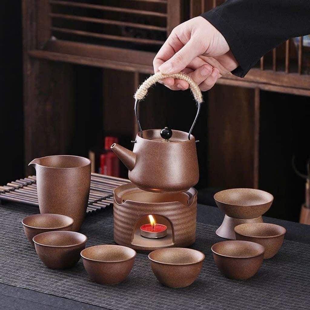  Bộ Ấm Trà Gốm Thô Cổ Điển Quai Xách Mây Kèm Bếp Nến BKCECN-10646 