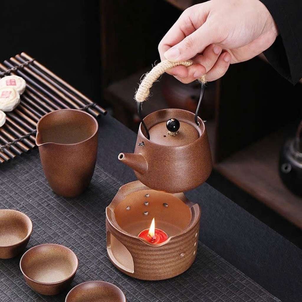  Bộ Ấm Trà Gốm Thô Cổ Điển Quai Xách Mây Kèm Bếp Nến BKCECN-10646 