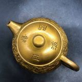  Ấm trà đồng vàng chạm nổi Vân Long triện chữ cổ BKMECN-10087 