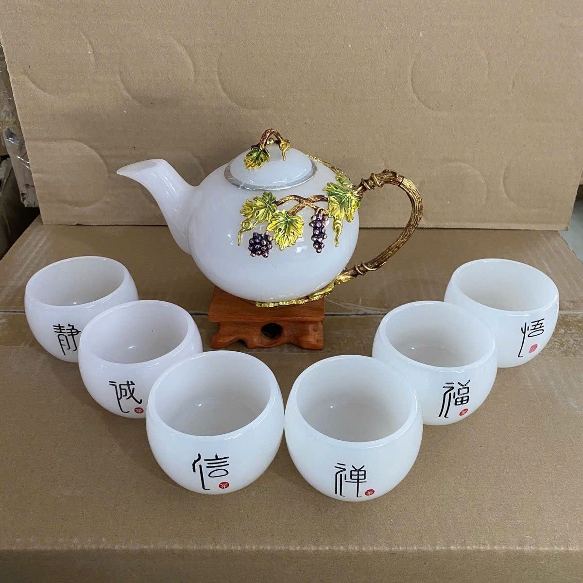  Bộ ấm chén ngọc màu trắng họa tiết hoa đắp nổi BKCECN-10207 