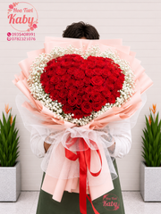 BÓ HOA 65 BÔNG HỒNG ĐỎ HÌNH TRÁI TIM