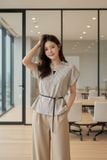  Áo thô kẻ nữ tay liền dáng suông thắt đai eo trang trí. 
