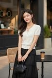  Áo tay cộc cổ tròn bo gấu dệt họa tiết 