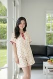  Bộ đồ nữ vải đũi vân mây tay cộc cổ tròn phối viền. 