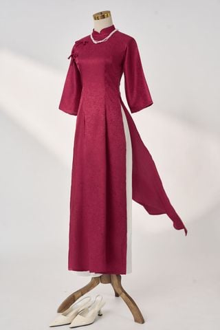 Áo dài Diêu Hà chất liệu gấm vân nổi đính nơ điệu đà