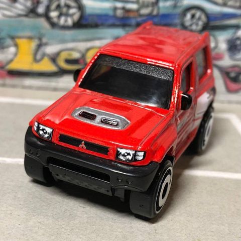  Xe HNK25 Hot Wheels Mitsubishi Pajero Evolution 