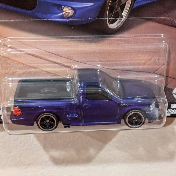 Xe HRT60 HOT WHEELS BOULEVARD 99 FORD F-150 SVT LIGHTNING
