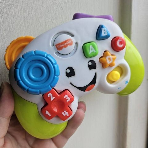  Đồ chơi HVY71 Fisher-Price Laugh and Learn Game and Learn Controller 