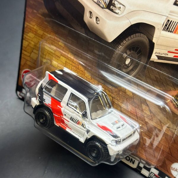 Xe mô hình  JBL26 23win04 Boulevard Mitsubishi Pajero Evolution White