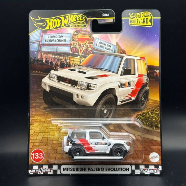 Xe mô hình  JBL26 23win04 Boulevard Mitsubishi Pajero Evolution White