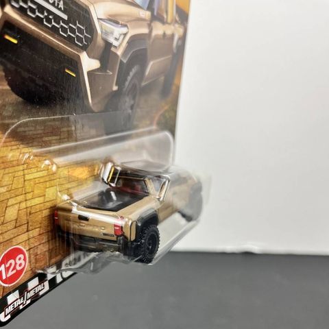  Xe JBL08 Hot Wheels Boulevard 2024 Toyota Tacoma TRD Pro Brown 