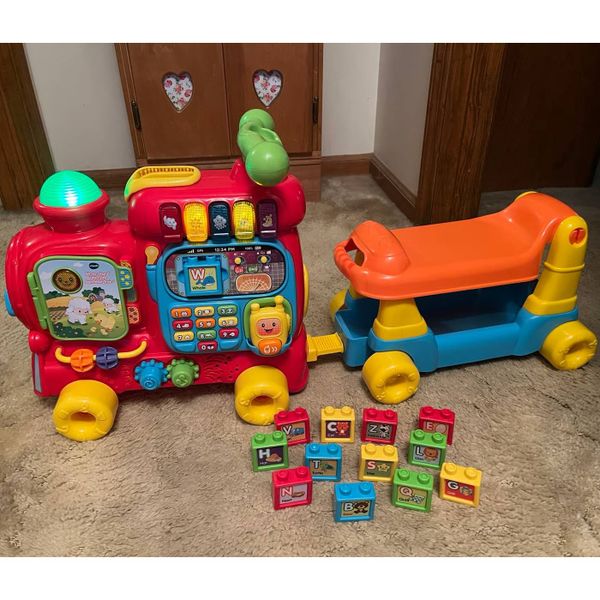 Đồ chơi 2 trong 1 VTech Push & Ride Alphabet Train