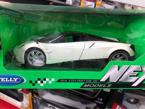  Mô hình xe Pagani Huayra 1:24 Welly- 24088W-Red 