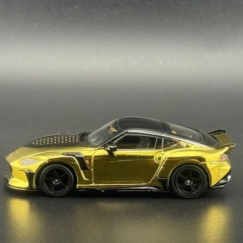  Xe Mini GT MGT00985 Nissan Z VeilSide FZ400 Gold Chrome 